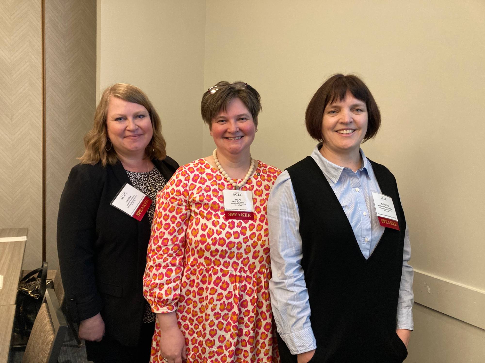 Jessica, Mary, and Katie standing together and smiling